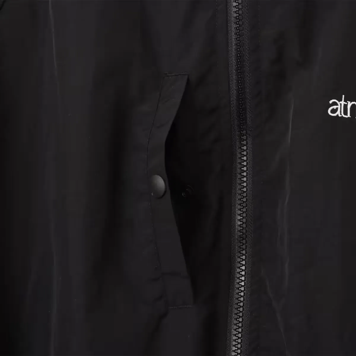 ATMOS NYLON TRACK JACKET